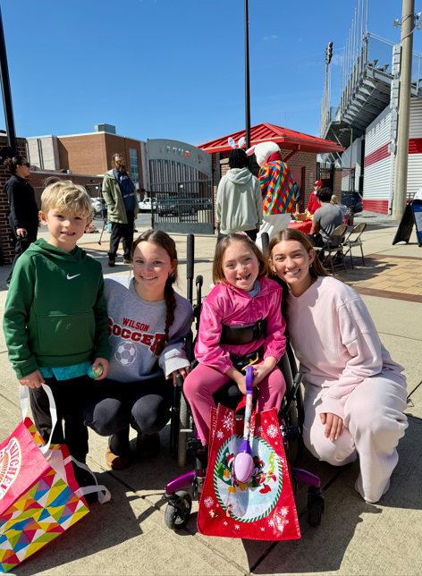 Students with bags ready to find easter eggs