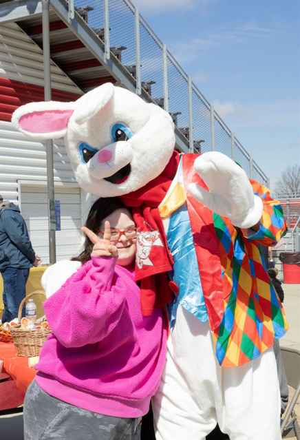 girl posing with the easter bunny