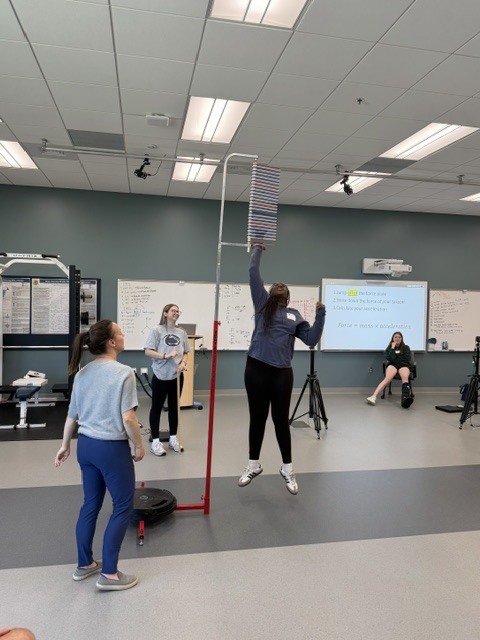 students jumping