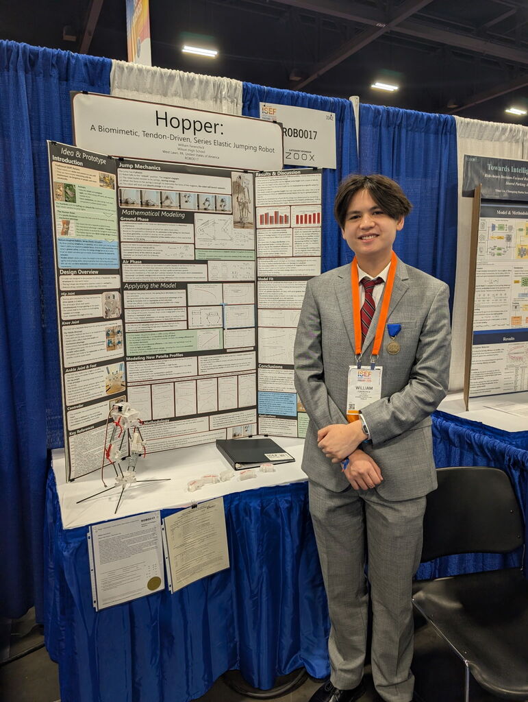 student with his board of research