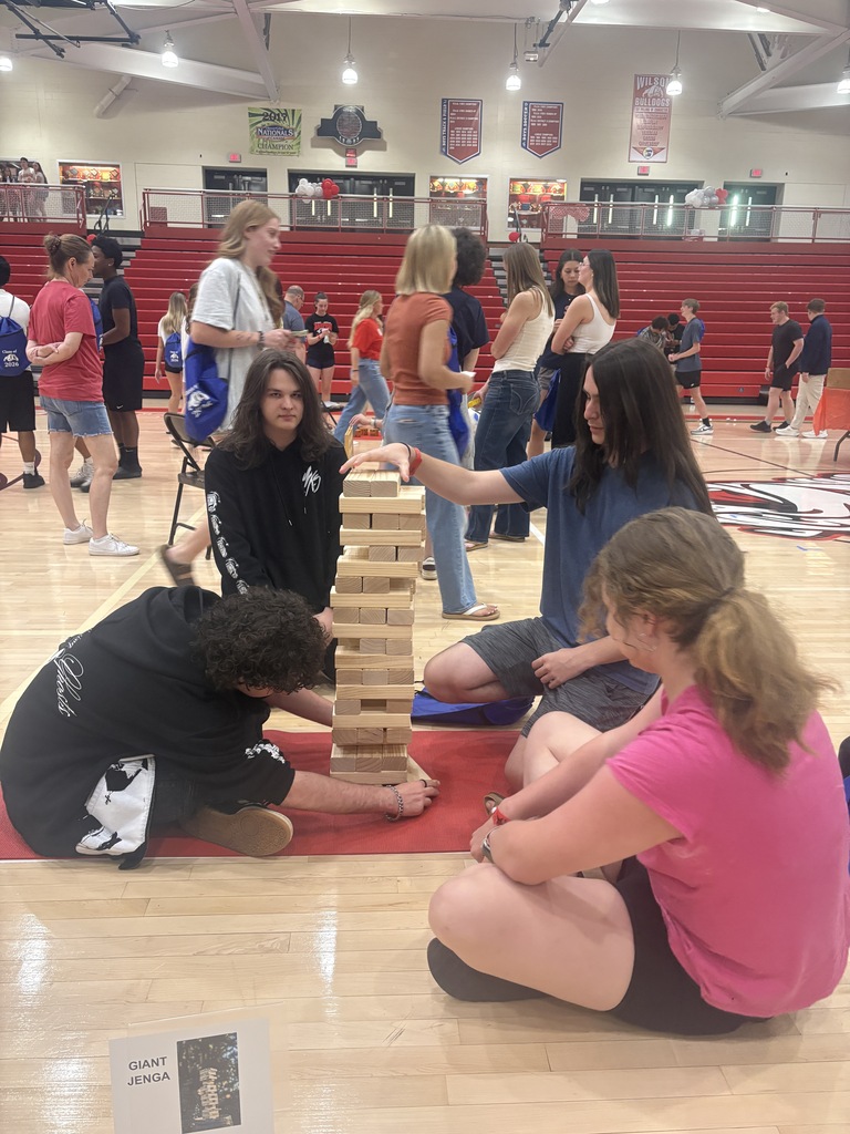 students stacking jenga