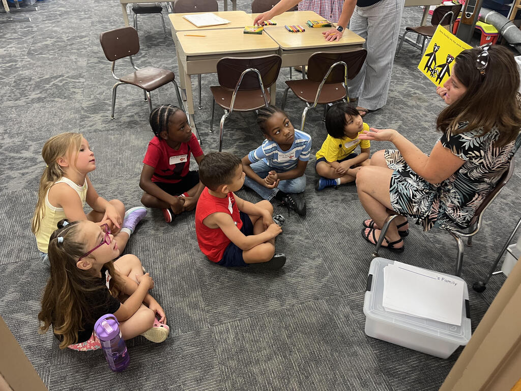 teacher reading to students