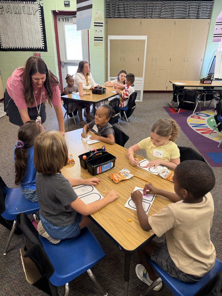 students coloring popsicle coloring page and eating gold fish
