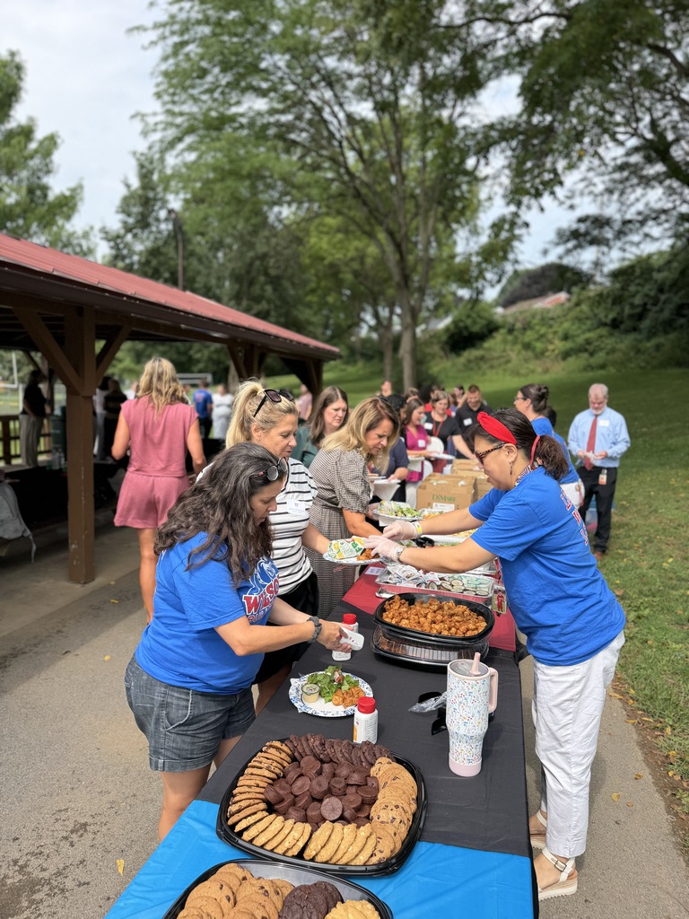 people waiting in line for food