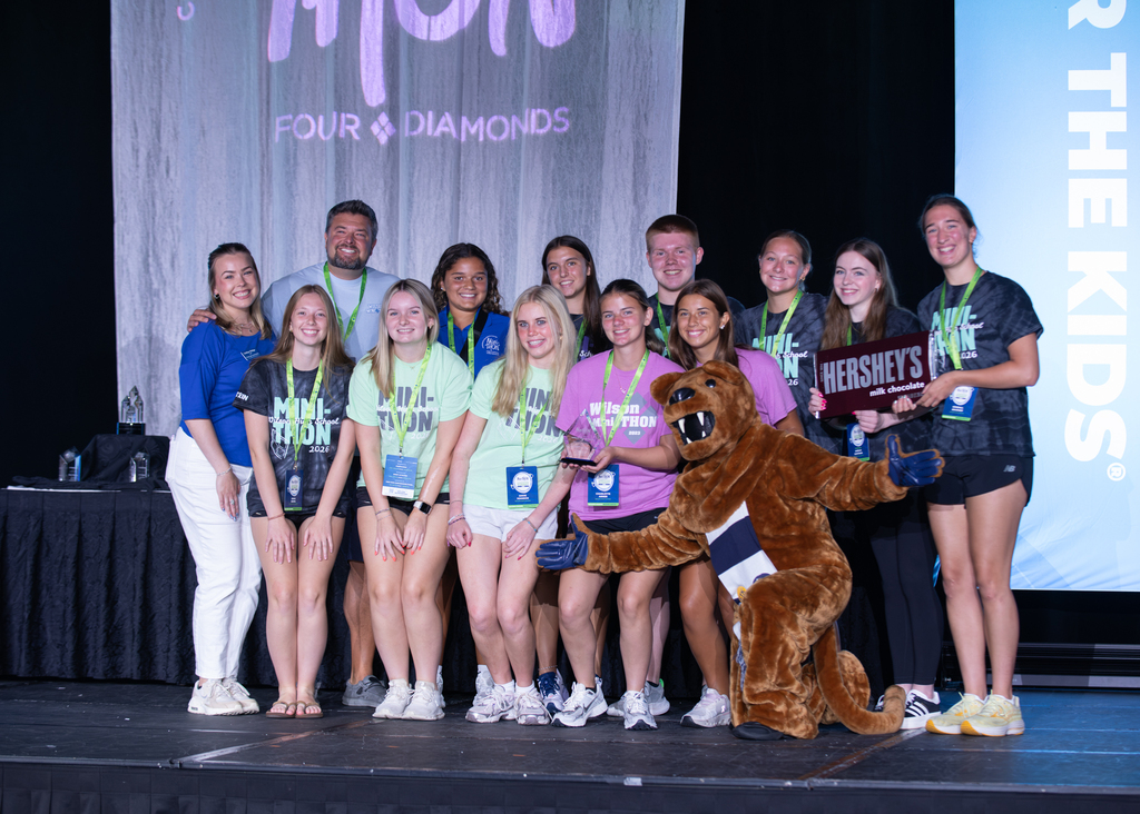 mini thon members on stage