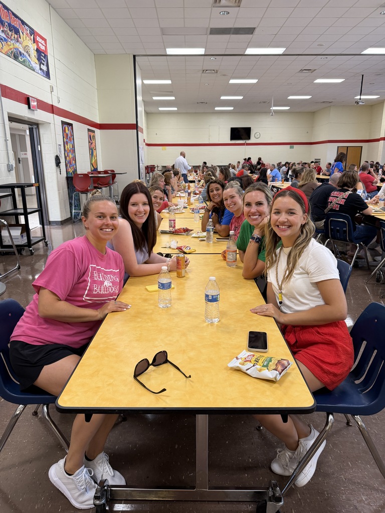 staff eating food in cafeteria