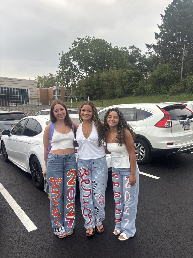 girls in painted jeans in the parking lot