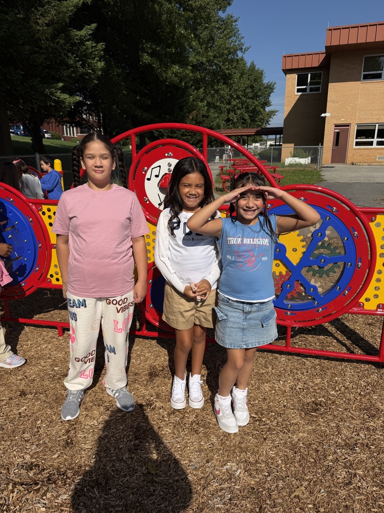 students smiling on the playground