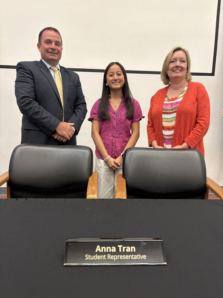 Anna tran with superintendent and board president
