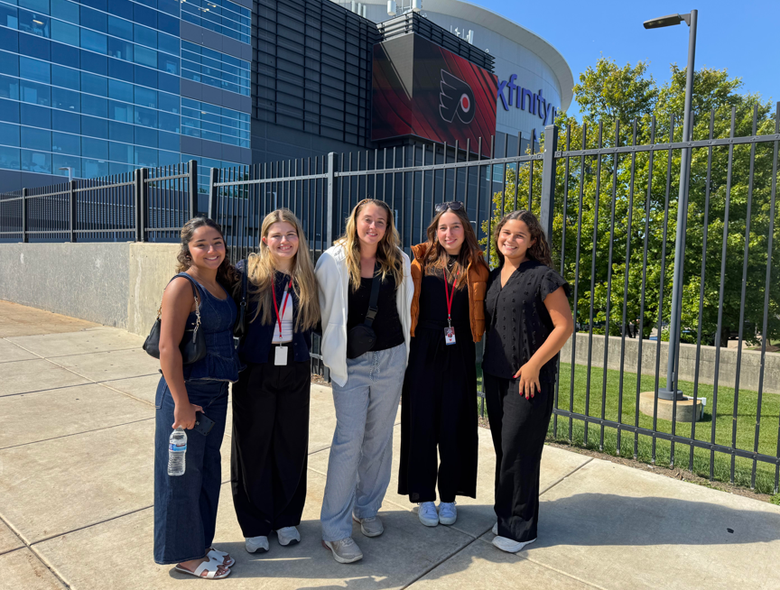Students standing outside of xfinity mobile arena