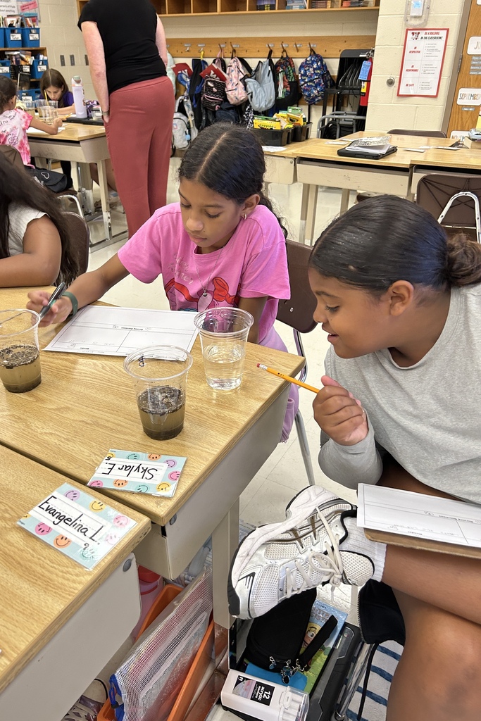 two girls investigating water