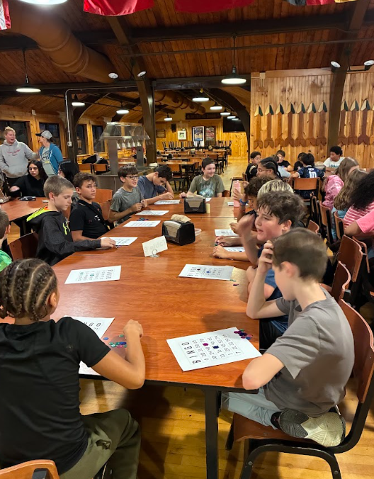 students playing bingo at dinner table