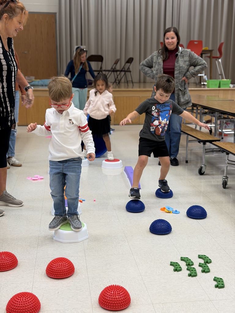 students going through obstacle course