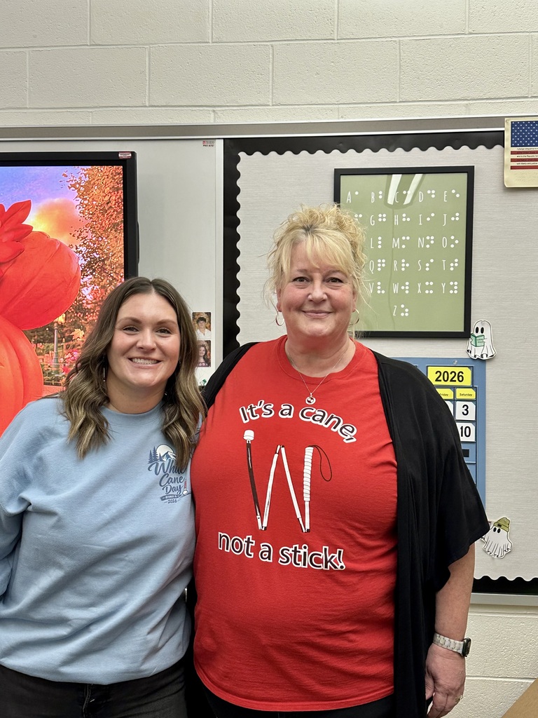 teachers in white cane shirt day