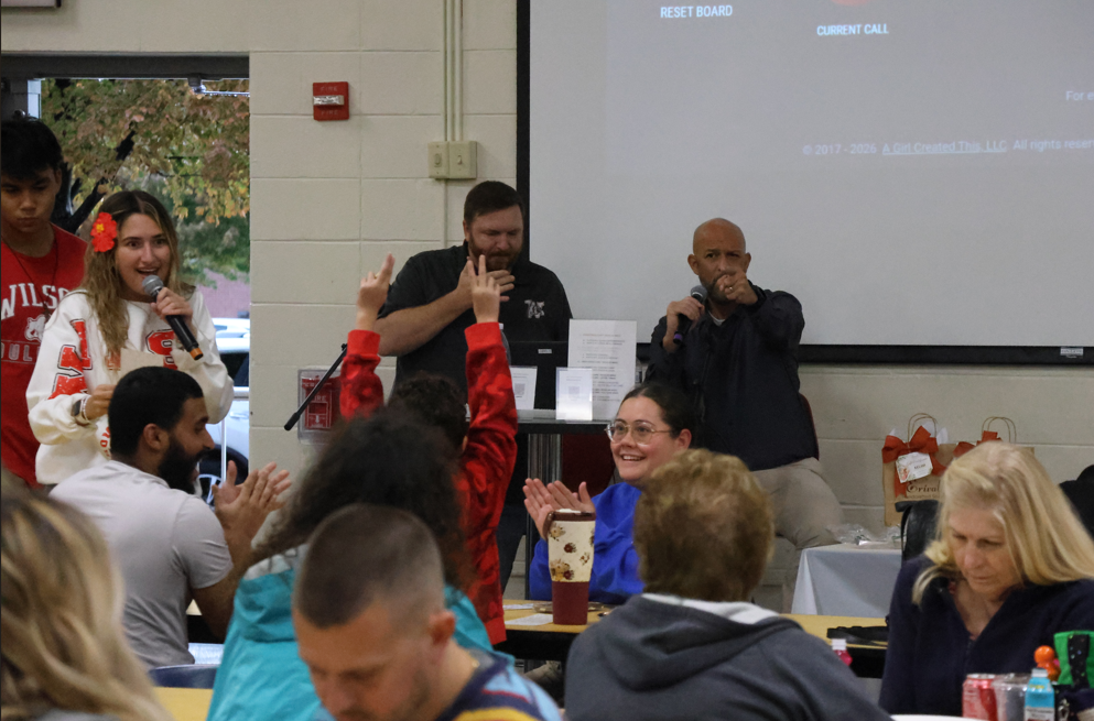 bingo callers pointing to winnder