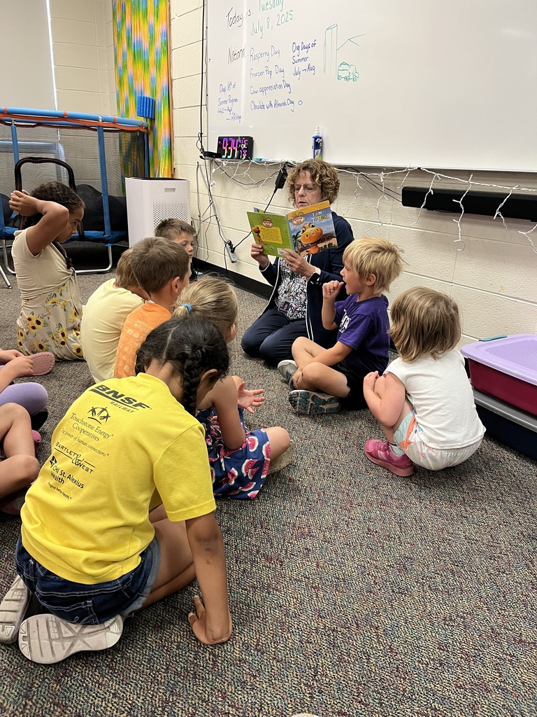 Mrs. Axt reading to the group.