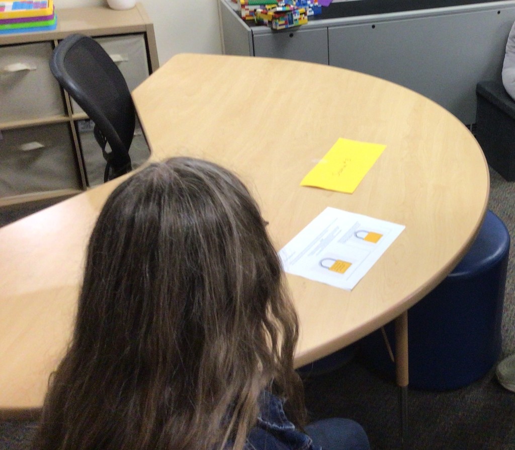 adult thinking through a puzzle