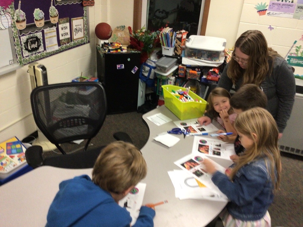 kids working on a word puzzle