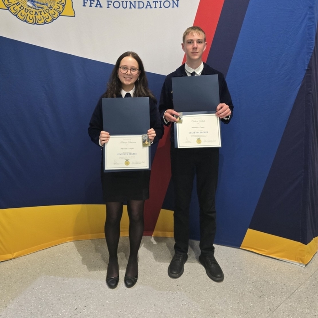 Colton and Aubrey with their State Degrees