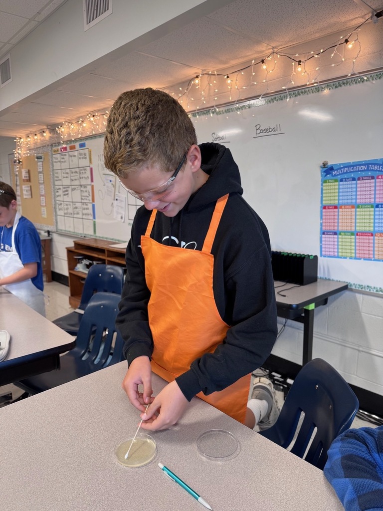 student using petri dish