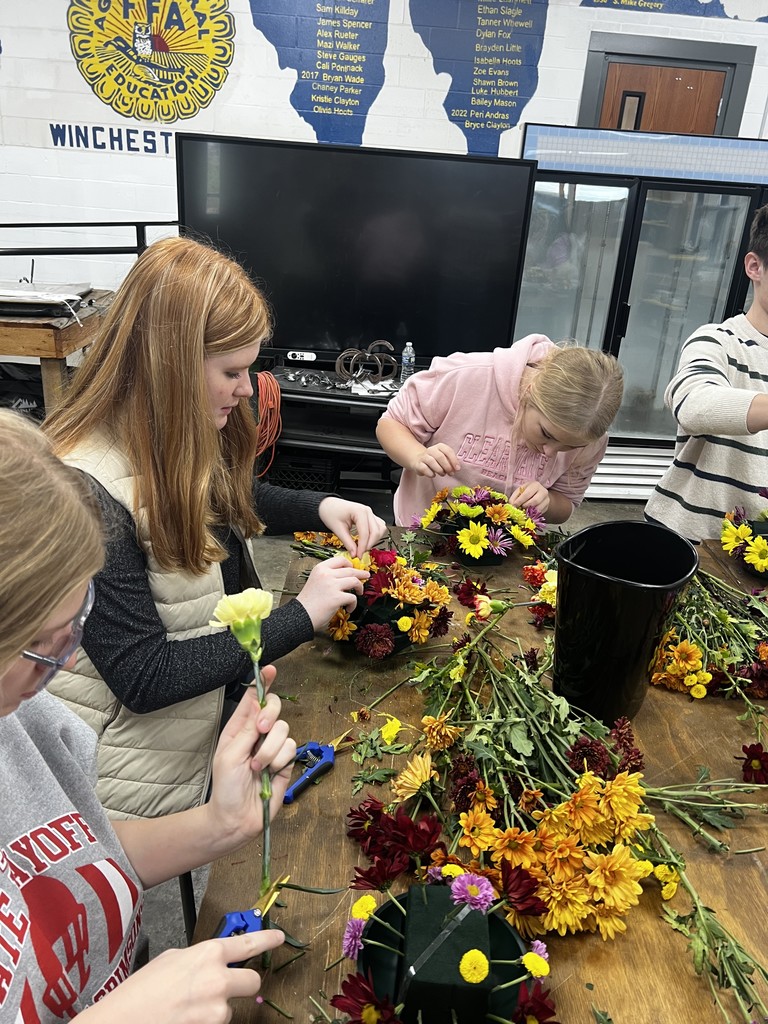 Kids working with flowers