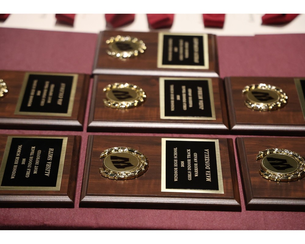 Awards are laid out on the table