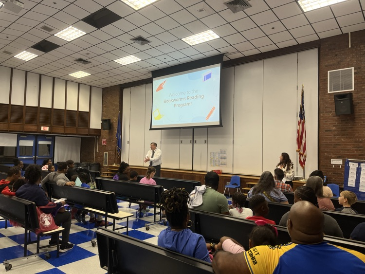 Mr. Gruber and Ms. Ferreira presenting in caf
