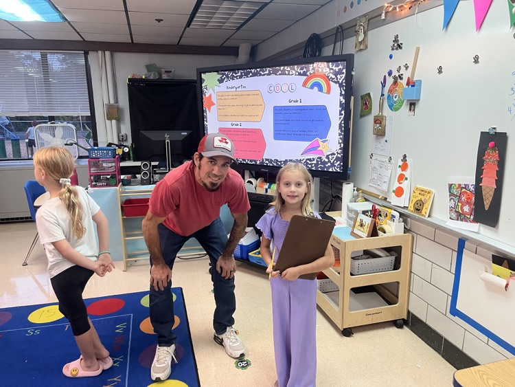 Dad and daughter in art class