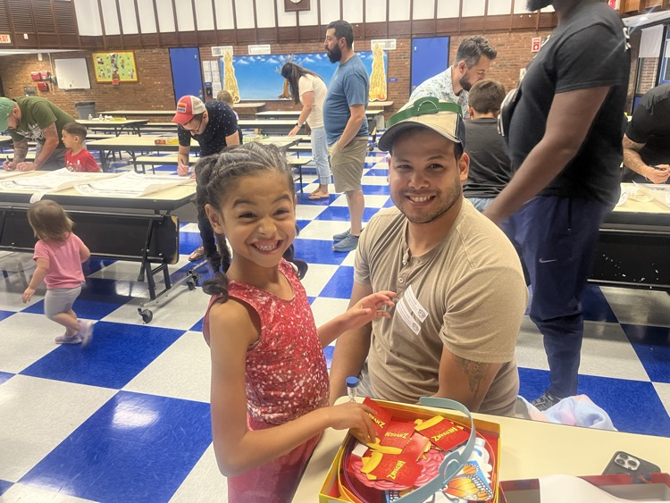 father and daughter at watch dogs kick off