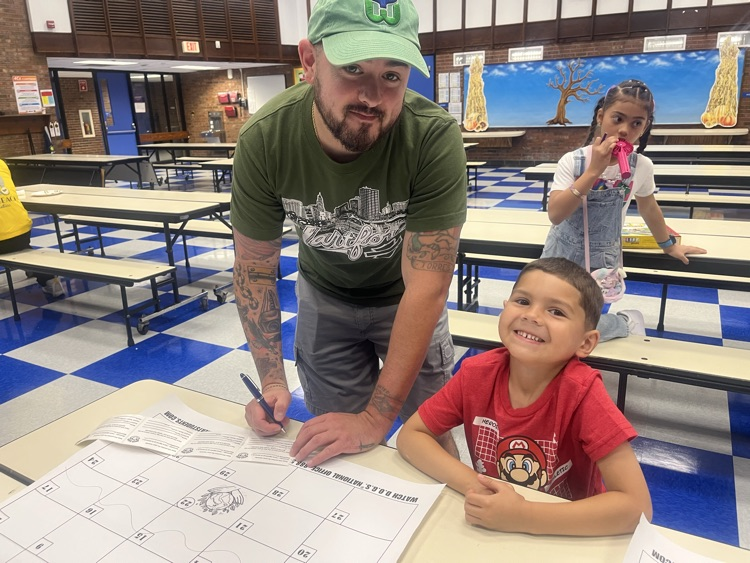 father signing up at watch dog event