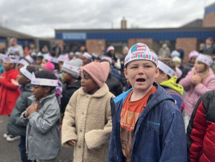 students outside for veteran’s day ceremony