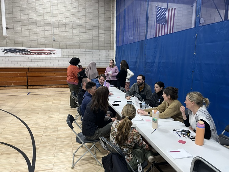 staff having fun with icebreaker at pd in gym at OE