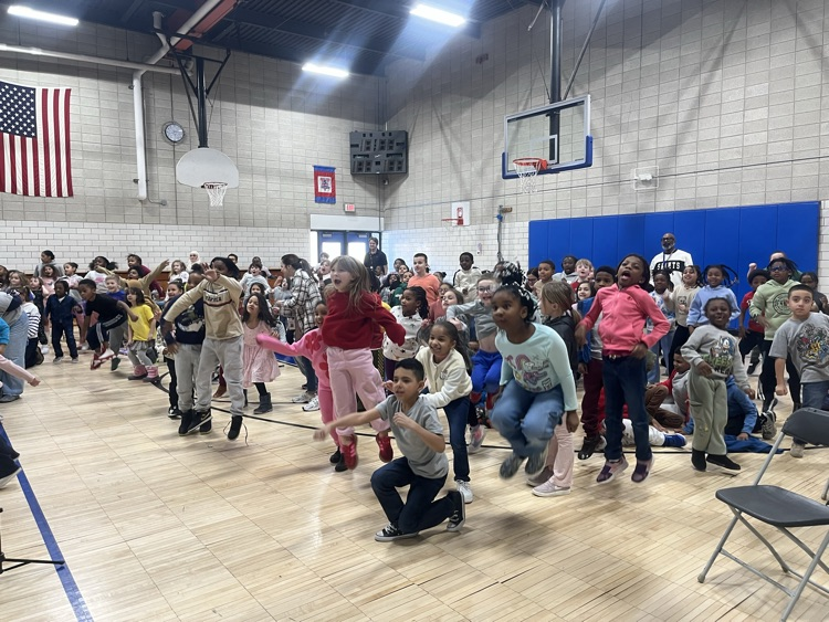 OE students doing a movement break in the gym 