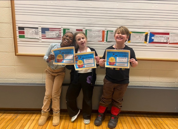 3 OE students smiling and holding their certificate