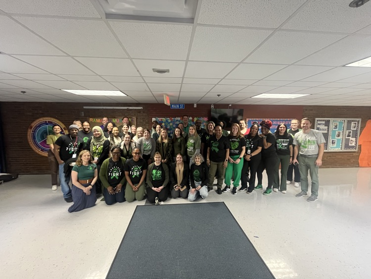 staff all wearing green in main lobby