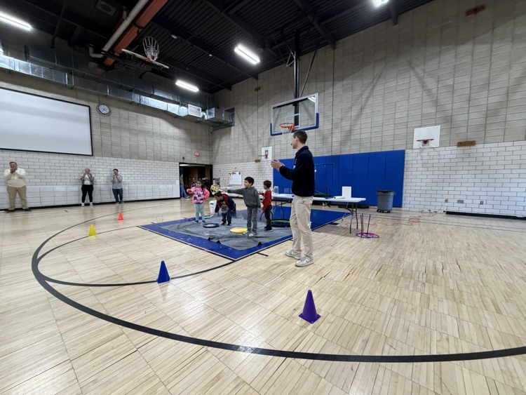 student inside a bubble at science centers assembly in gym