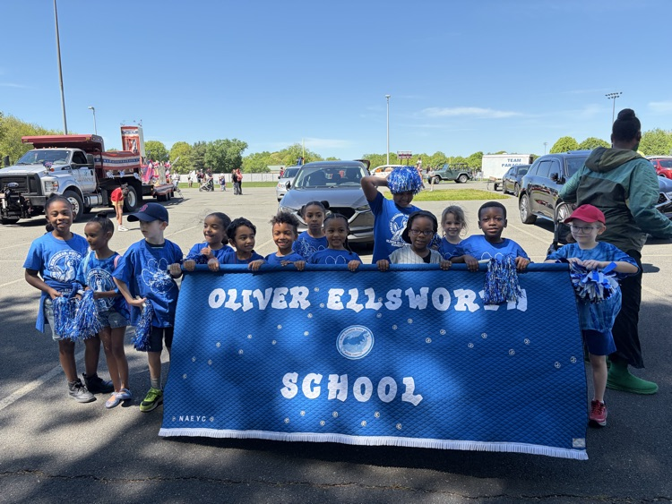 OE students holding banner