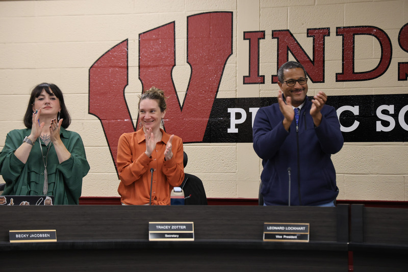 The board is applauding to a speaker