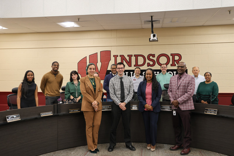 Board members with the Teacher of the Year