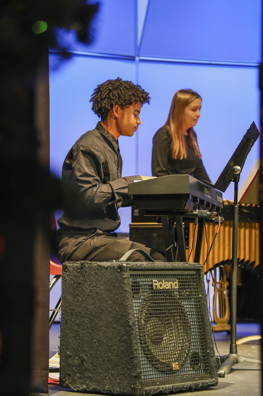 Student playing the piano