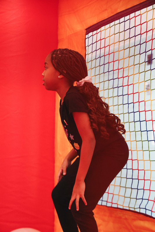 Girl on an inflatable trampoline