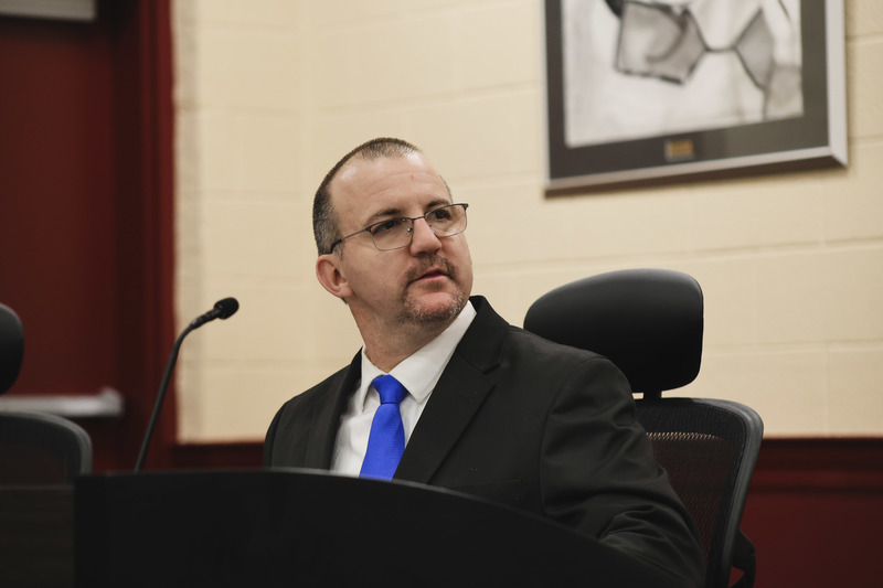 Board member, Jeremy C. Halek, at the meeting