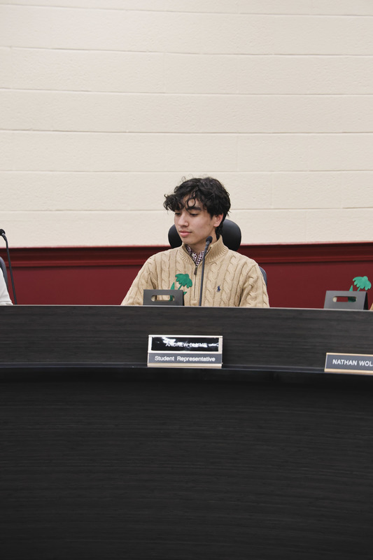 Nev student representative, Andrew Blume, is being welcomed to the board of education.