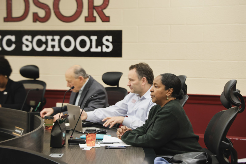 Board of Education members getting ready for the meeting