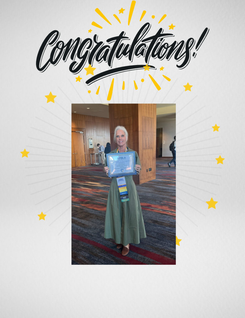 picture of Mrs. Stovall with her award
