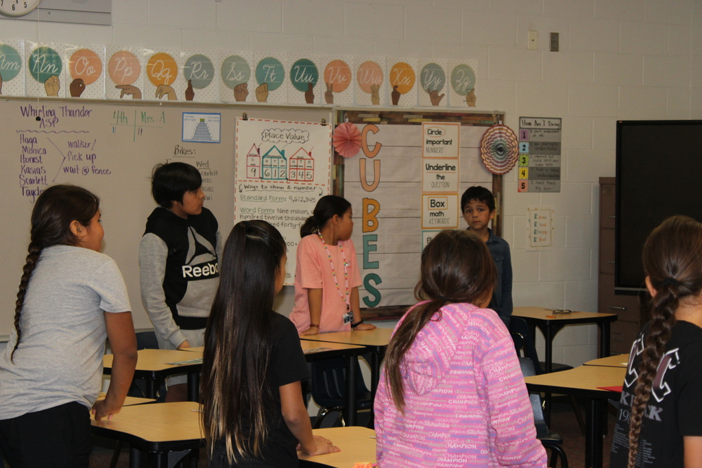 Students standing for activity