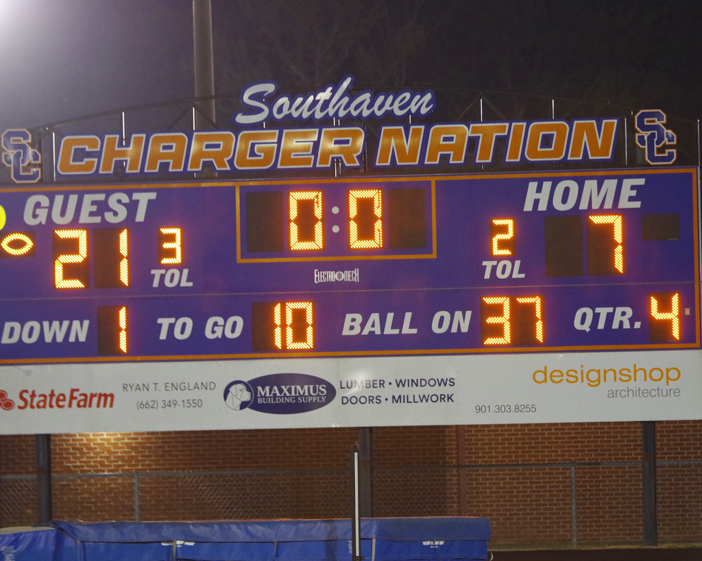 Scoreboard displays: Chargers Nation. Guest 21. Home 7. 4th quarter. Down 1. 10 seconds. 37 yards.
