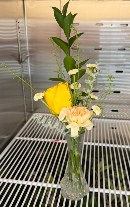 Bud vase with yellow rose and greenery- $7.00