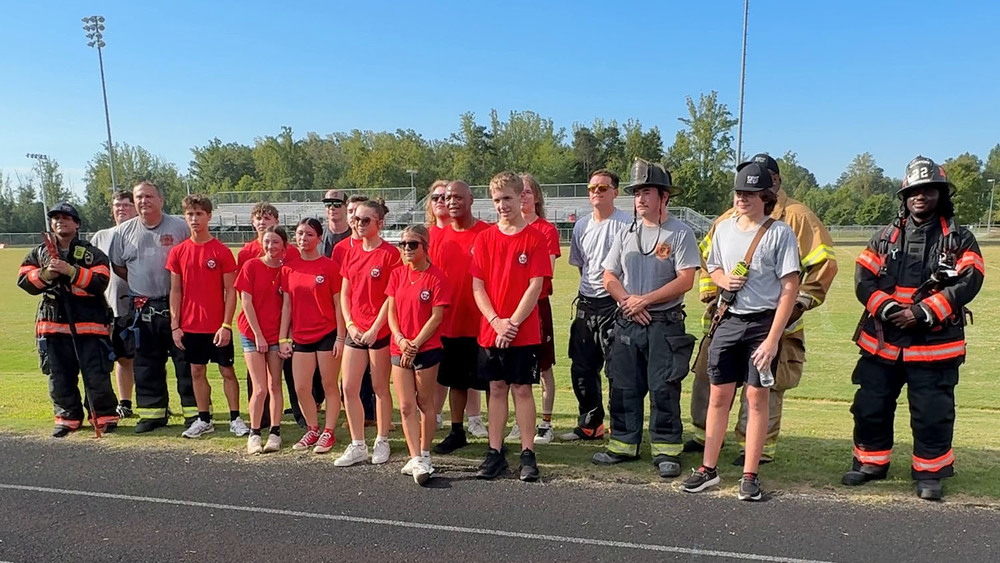 Image of Walkertown HS Fire Academy students with Walkertown Fire Dept. members