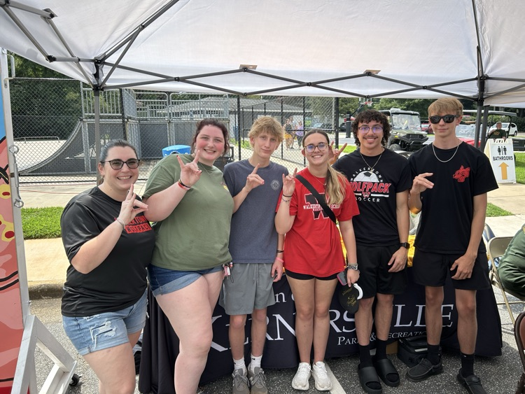 students working a stand